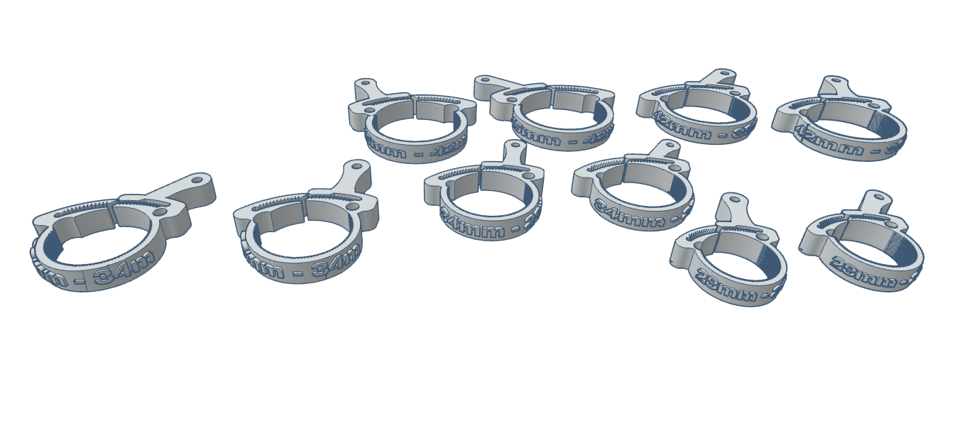 Ten firearm accessory rings displayed in a row, featuring a simple design and engraved text.