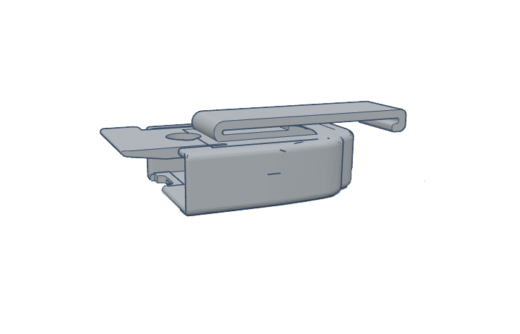 A gray firearms accessory clip with a hook and flat base design shown from a side angle.