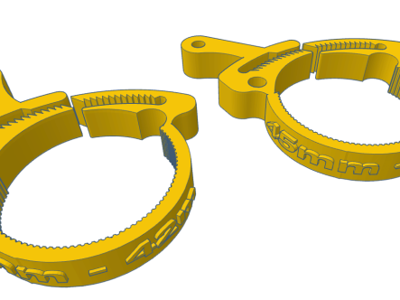 Two yellow firearm accessory clamps designed for securing components with a 45mm diameter.